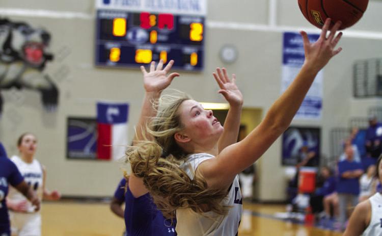 HUNTER KING | DISPATCH RECORD Addison Borchardt makes a right-handed layup during the first half of the Lady Badgers’ game against Copperas Cove on Tuesday.