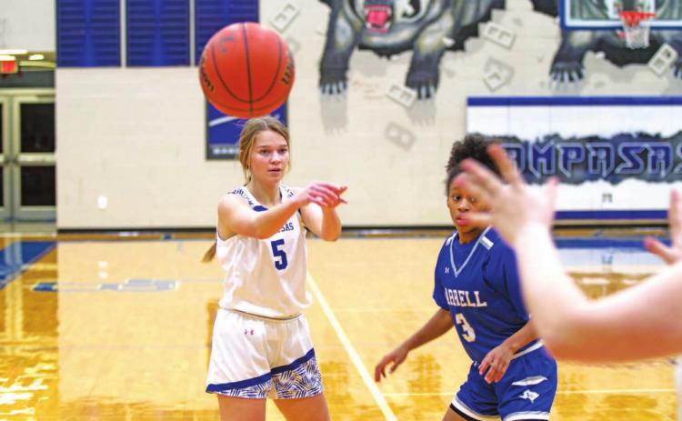 HUNTER KING | DISPATCH RECORD Hadley Oncken completes a pass to a teammate during the Lady Badgers’ double-digit win over Jarrell.