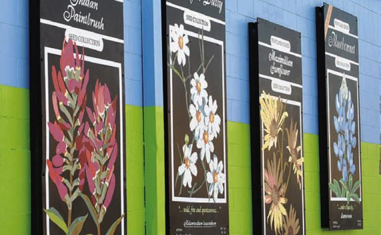 Local nonprofit reveals renovated mural
