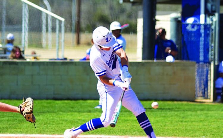 Timber Gholson swings at a pitch. He picked up three hits in Tuesday’s home game. HUNTER KING | DISPATCH RECORD