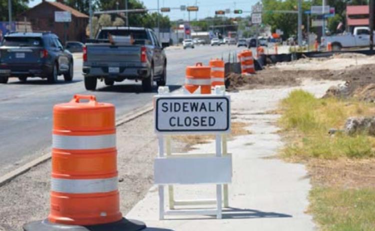 Construction cones and signs were alongside Key Avenue Friday afternoon where a new Starbucks is being built. MONIQUE BRAND | DISPATCH RECORD
