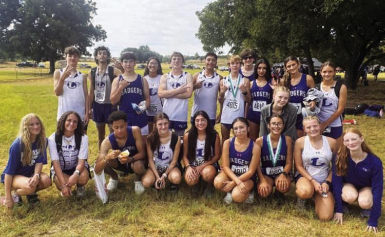 The Badger cross country team poses for a eam photo after Friday’s meet at Floyd Farms in Lampasas. COURTESY PHOTO