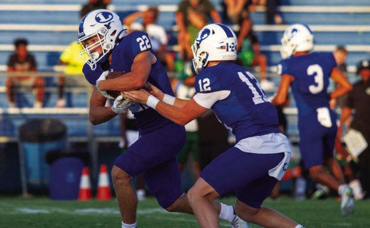 Sophomore quarterback Ross Kothmann will face another tall task this week against non-district opponent Lago Vista. Kothmann has been at the center of the Badgers’ offense this season, averaging nearly 230 passing yards per game. ANA SOFIA MEYER | DISPATCH RECORD