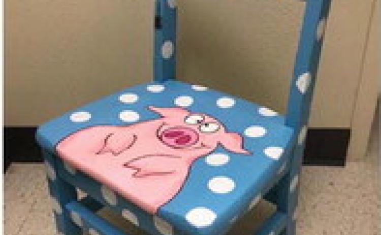 A chair depicting “Charlotte’s Web” was submitted by a local artist for the 2022 Painted Chair Event fundraiser. courtesy photo | Lampasas Public Library