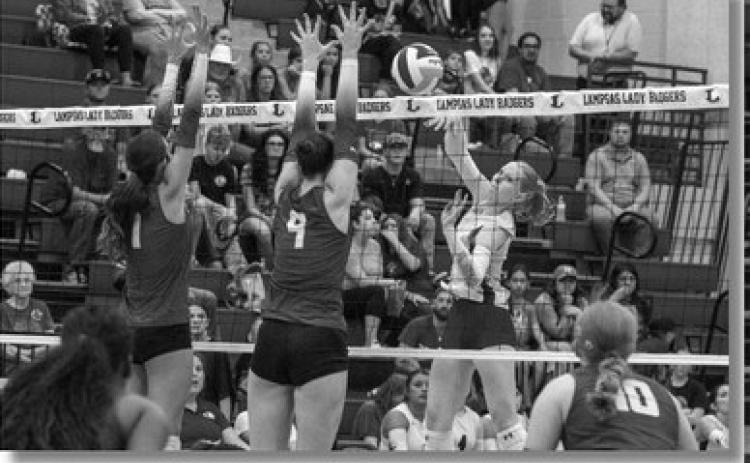 Lampasas outside hitter Mattie McBeth levels a slam over the net. ANA SOFIA MEYER | DISPATCH RECORD