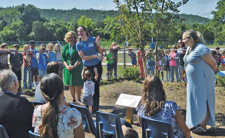 Taylor Creek Elementary students Devlin Eveleth, 10, and his 8-year-old brother Shaemus were memorialized during a remembrance ceremony at the campus Monday morning. erick mitchell | dispatch record
