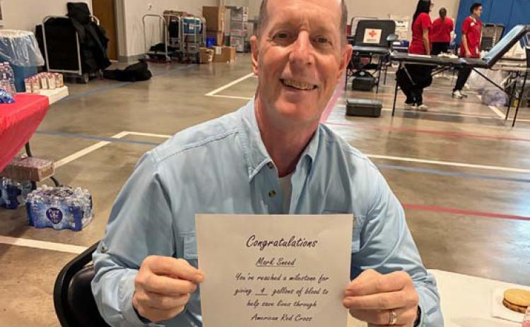 Mark Sneed has donated a total of four gallons of blood. court esy photo