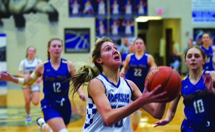 Girls’ basketball team battles for win over Lago Vista
