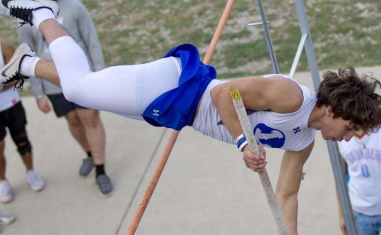 Ethan Moreno earned a bronze, a silver and a gold medal in separate field events at Thursday’s meet. In pole vaulting, he placed third. JEFF LOWE | DISPATCH RECORD