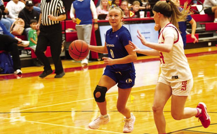 HUNTER KING | DISPATCH RECORD Tenley Langford eyes the basket as she drives in for a layup against Salado.