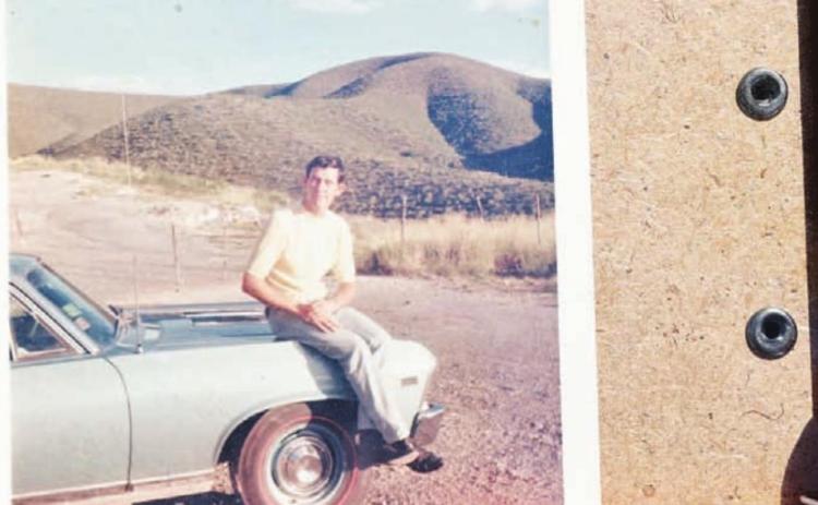 Elzie Jones shows a photo of his car a week after he bought it in the late 1960s. COURTESY PHOTO