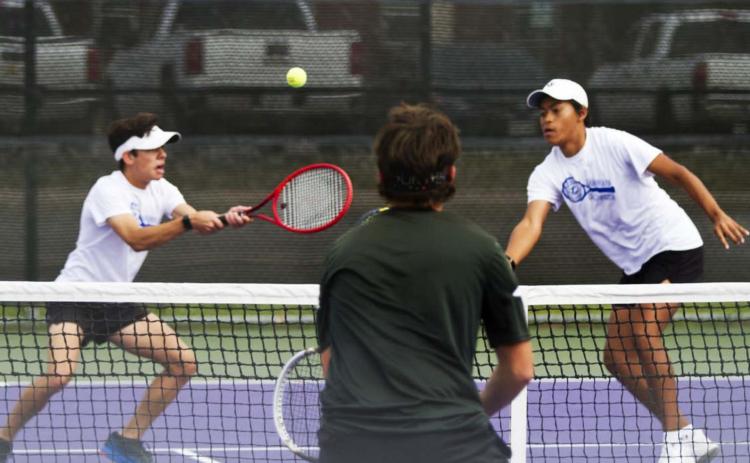 Sam Zmolik, left, and Mario Aguirre compete in the boys’ doubles district championship against Gatesville on Tuesday at Tarleton State University. JEFF LOWE | DISPATCH RECORD