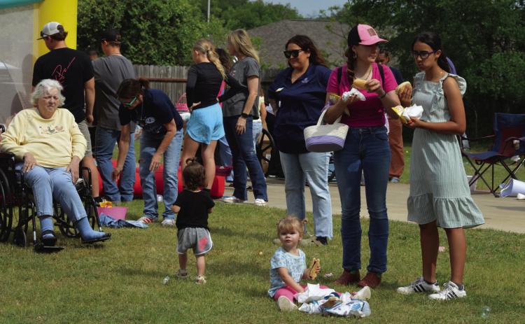 From hot dogs to live music, and bouncy houses, Lily Springs Rehabilitation and Healthcare Center had a little bit of eveything for its Good Friday event. ERICK MITCHELL | DISPATCH RECORD