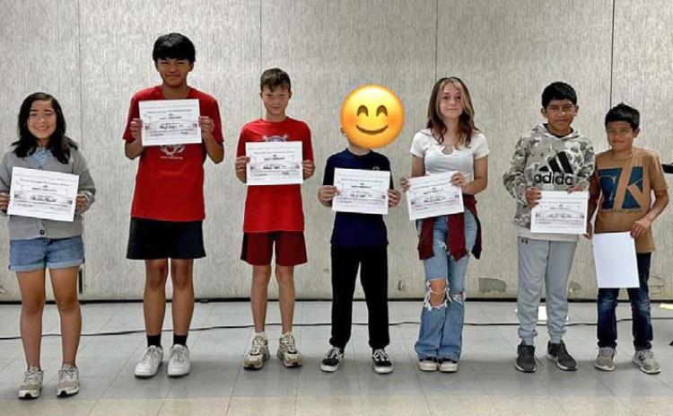 Hanna Springs Elementary celebrates its fifth-grade perfect attendance award winners. Students without a photo release have been redacted from the photo. COURTESY PHOTO
