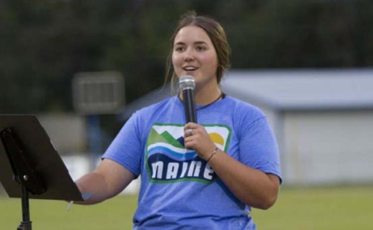 Saydie Smith speaks to the crowd at Fields of Faith. HUNTER KING | DISPATCH RECORD