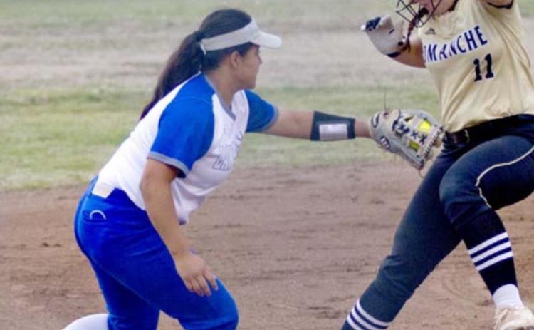 Mia Maldonado tags out a Comanche runner on the way to third base on Friday. JEFF LOWE | DISPATCH RECORD