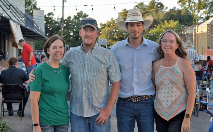 From left to right: Amanda Honea, Ross Honea, Stan Almazan and Jacque Almazan pose for a photo before Western Night on Western activities get underway. erick mitchell | dispatch record