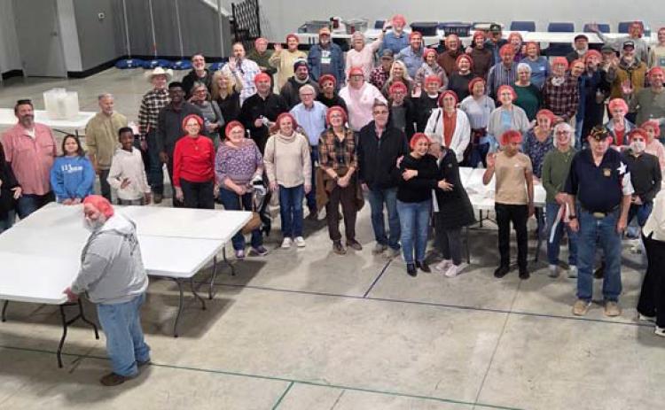 The Lampasas Ministerial teamed up with Rise Against Hunger, an international nonprofit organization dedicated to fighting global hunger, to pack 10,000 meals on Jan. 31. A group of 76 volunteers from five local churches participated in the event that was held at New Covenant Church. COURTESY PHOTO
