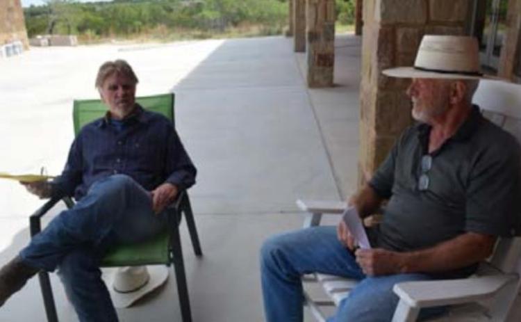 Ken Halpert, at left, and Dan Christy talk about their concerns with a proposed solar farm and tax incentives that might be offered for the project. MONIQUE BRAND | DISPATCH RECORD