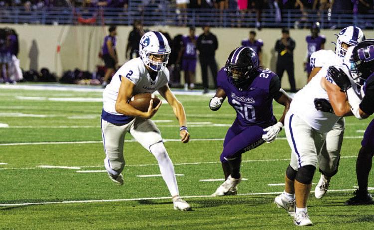 HUNTER KING | DISPATCH RECORD Bryson Roberts played the second half at quarterback and nearly led the Badgers to a win.