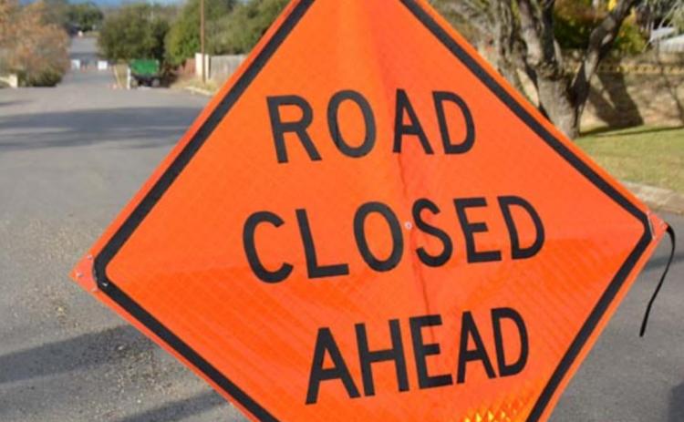 A sign warns of closures on portions of West Third Street. DAVID LOWE | DISPATCH RECORD