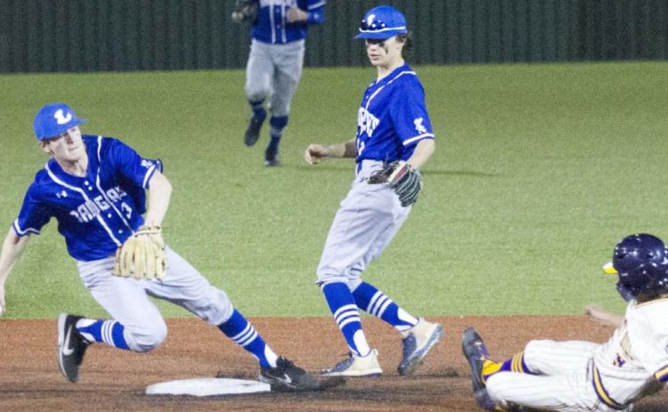 Badger shortstop Carson Bekker, far left, forces an out at second base just ahead of a sliding base runner. JEFF LOWE | DISPATCH RECORD