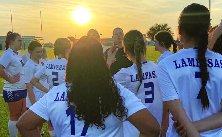 Head coach Emma Sharp talks to her team after their match against Marble Falls. COURTESY PHOTO