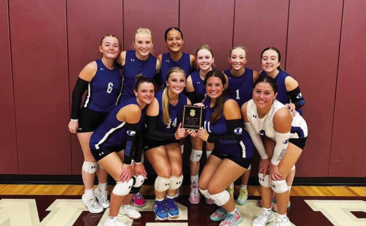The volleyball team poses with their plaque from the Killeen tournament last weekend. COURTESY PHOTO | LAMPASAS ATHLETICS