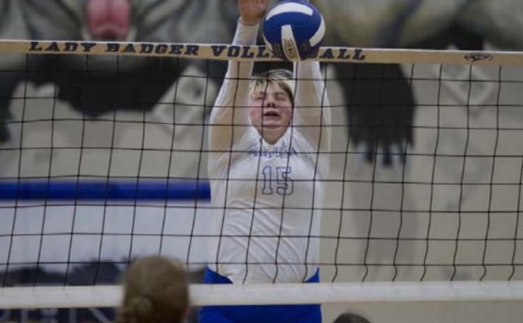 Morgan Lovejoy blocks an attempted Brownwood kill during Tuesday’s match. HUNTER KING | DISPATCH RECORD