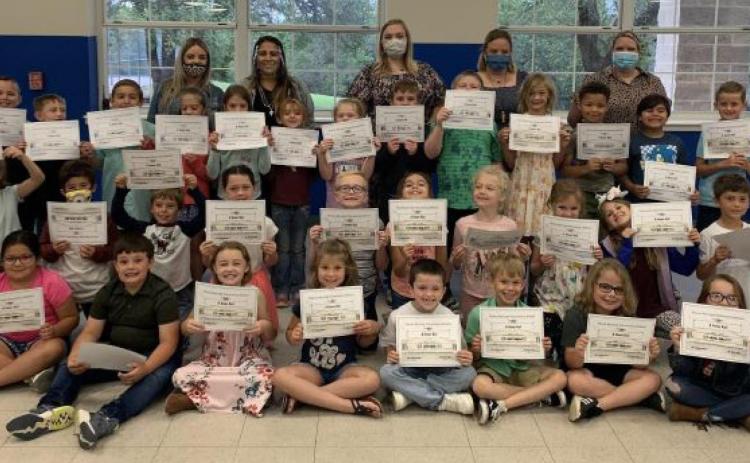 Hanna Springs Elementary School first-graders who kept an all-A average this year are shown with their teachers. COURTESY PHOTO