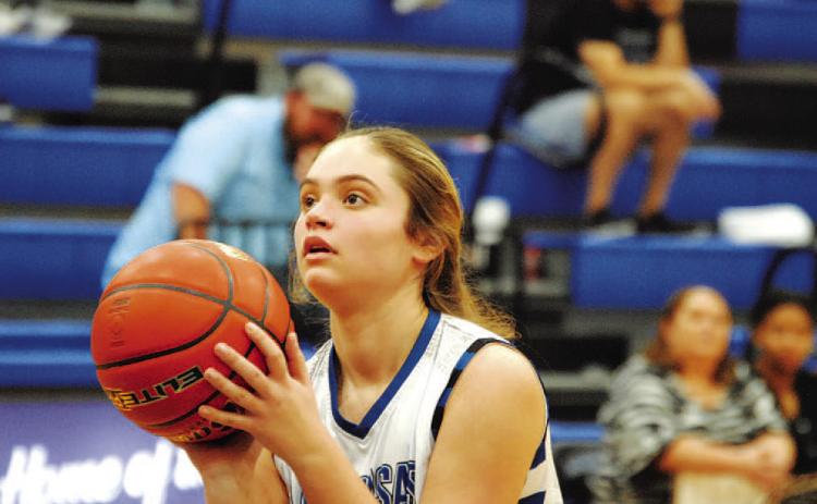 Morgan Bobo prepares to shoot a free throw during the win over Rouse. HUNTER KING | DISPATCH RECORD