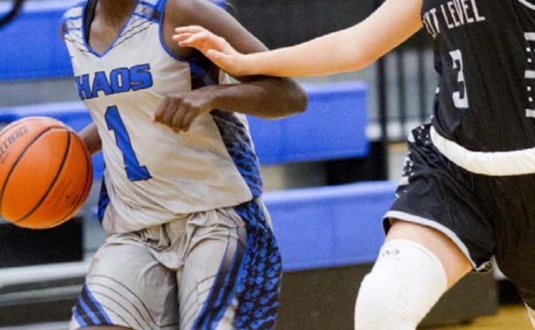 Nattie Martin dribbles past a defender in Lampasas’ last game on Monday night in the Hill Country Hoops League. JEFF LOWE | DISPATCH RECORD