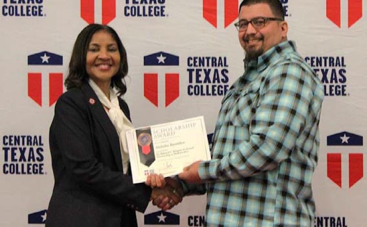 COURTESY PHOTO At Central Texas College Foundation’s 34th Annual Scholarship Ceremony, Nicholas Basaldua of Lampasas received the Dr. Edward L. Wagner Endowed Scholarship in Mathematics, presented by CTC Chancellor Dr. Michele J. Carter.
