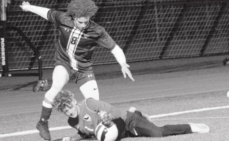 Keshawn McElwain (8) attempts a goal against Salado, but a diving save by the goalie keeps Lampasas scoreless on Tuesday. JEFF LOWE | DISPATCH RECORD
