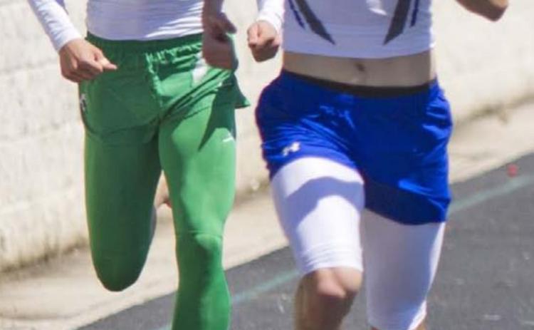 Cody Hinson beats a Burnet runner in the 400-meter dash for a silver medal on Thursday. Lampasas is scheduled to compete in the district meet in Brownwood March 31-April 1. JEFF LOWE | DISPATCH RECORD