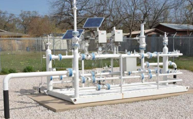 The Lampasas City Council approved a 45-day hold on a rate increase proposed by Atmos Energy. Shown here is Atmos Energy infrastructure at the corner of First and Willis streets. MONIQUE BRAND | DISPATCH RECORD