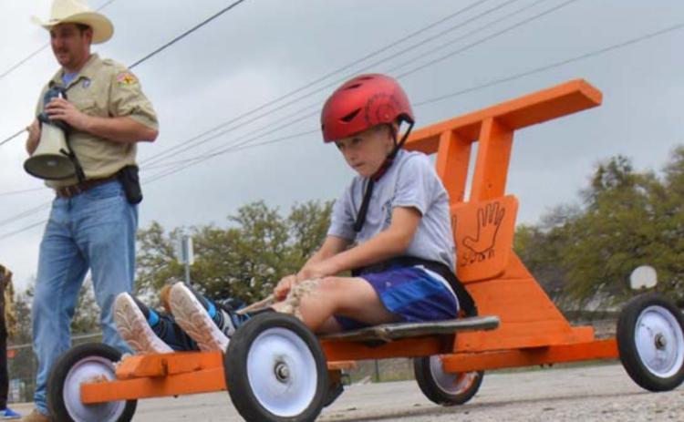 Seven-year-old Philip Ischy of Lampasas Pack 100 competes in his first Downhill Derby Race. MONIQUE BRAND | DISPATCH RECORD