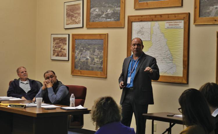 ERICK MITCHELL | DISPATCH RECORD Lampasas High School Principal Paul Weinheimer provides a campus update to LISD school board members during last week’s regular meeting.