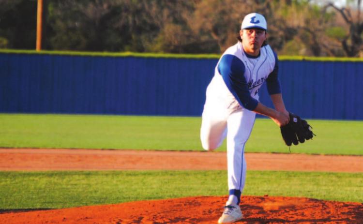 Tak Stinnett lets a pitch go during his complete game shutout of Brownwood earlier this season. HUNTER KING | DISPATCH RECORD