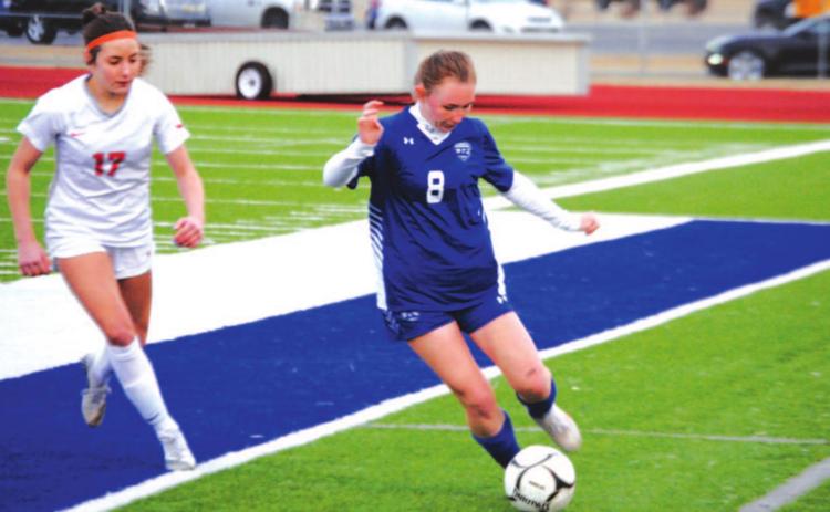 Nevaeh Stevens dribbles down the left side of midfield against Lake Belton last week. HUNTER KING | DISPATCH RECORD