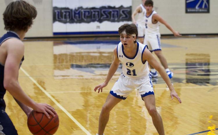 Austin Wilson squares up to play defense during the Badgers’ full-court press against Austin LASA on Monday. HUNTER KING | DISPATCH RECORD