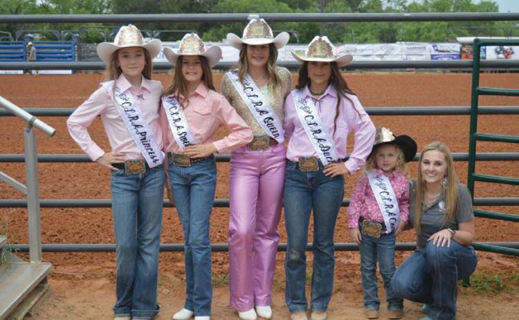 The 2025 County of Lampasas Rodeo Association Queen Court, from left to right, includes Princess Allie Urich, Sweetheart Aria Parks, Queen Hadyn Ferguson, Duchess Emma Easter and Contessa Riley Thompson, joined by her mother Alexis Thompson. ERICK MITCHELL | DISPATCH RECORD