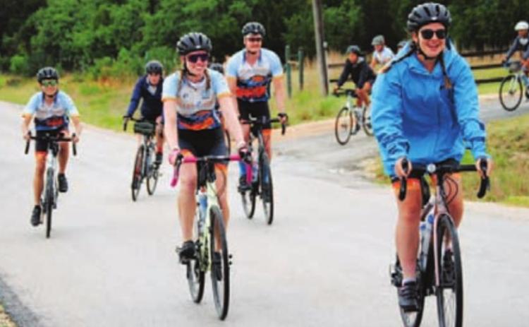 Riders with Texas 4000 head out on their journey to Alaska, a 70- day bike ride raising money for cancer research. HUNTER KING | DISPATCH RECORD