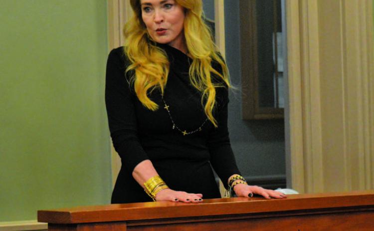 Michelle Wittenburg provides county officials with her career summary during Monday’s Lampasas County Commissioners Court meeting. The court approved a contract agreement with Wittenburg to provide lobbying services for the county. EERICK MITCHELL | DISPATCH RECORD