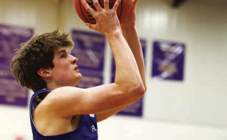 HUNTER KING | DISPATCH RECORD Calum Mitchell rises up for a shot.