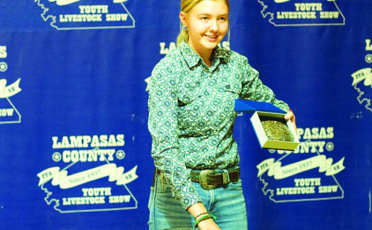 Sydney Purdy took home the Senior Showmanship Award for rabbit exhibitors. HUNTER KING | DISPATCH RECORD