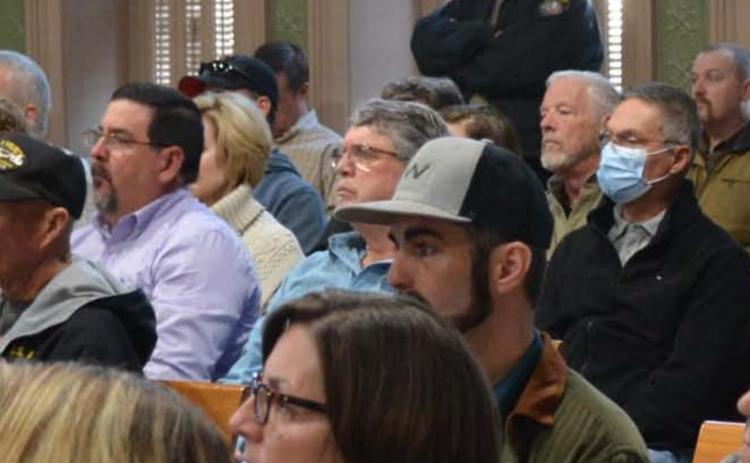 A packed courtroom audience listens to representatives from GreenGo outline its proposal Monday morning. MONIQUE BRAND | DISPATCH RECORD