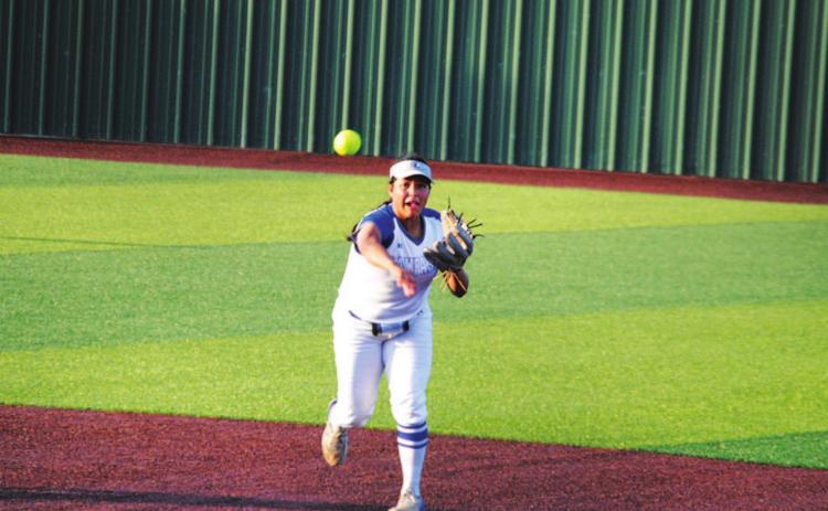 Mia Maldonado throws across the diamond from shortstop to record an out against Argyle last Friday. HUNTER KING | DISPATCH RECORD