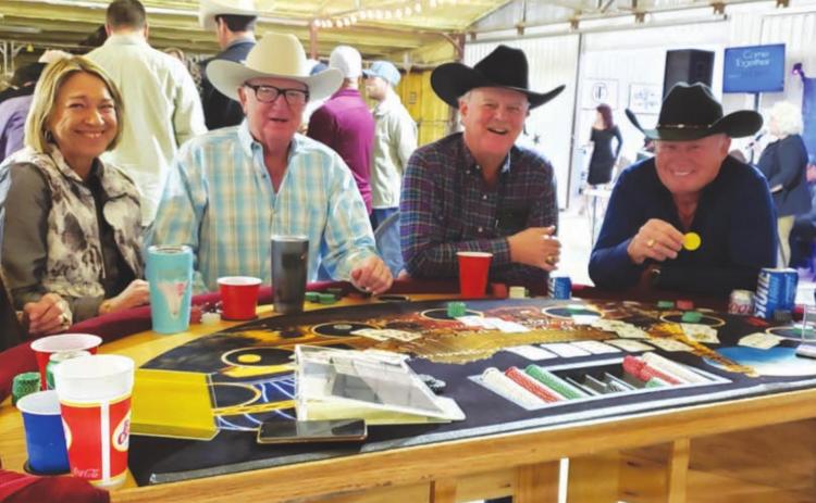 Particpants enjoy festivities at the 2020 Wild West Casino Night hosted by Vision Lampasas. This year’s event has been postponed. FILE PHOTO