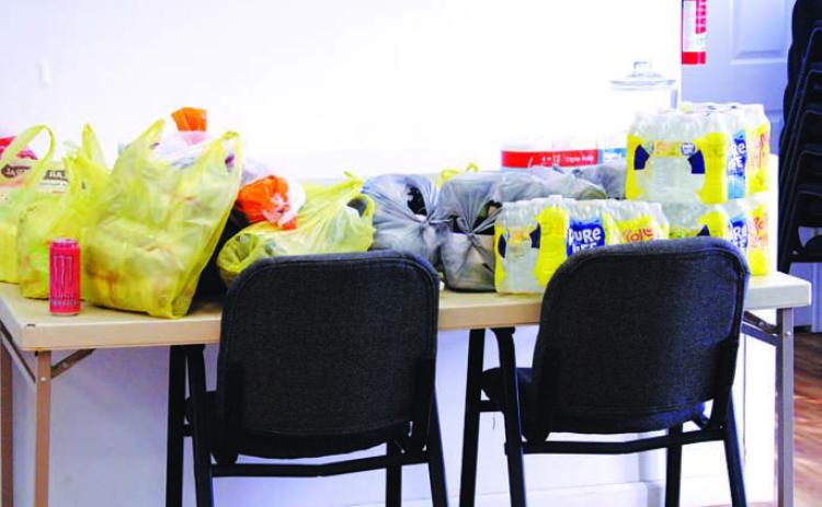 Sacks of food and water donated to Lampasas Community Church were on hand when the facility opened Thursday to those in need of a nourishing meal and a warm place to spend the night. JOYCESARAH MCCABE | DISPATCH RECORD
